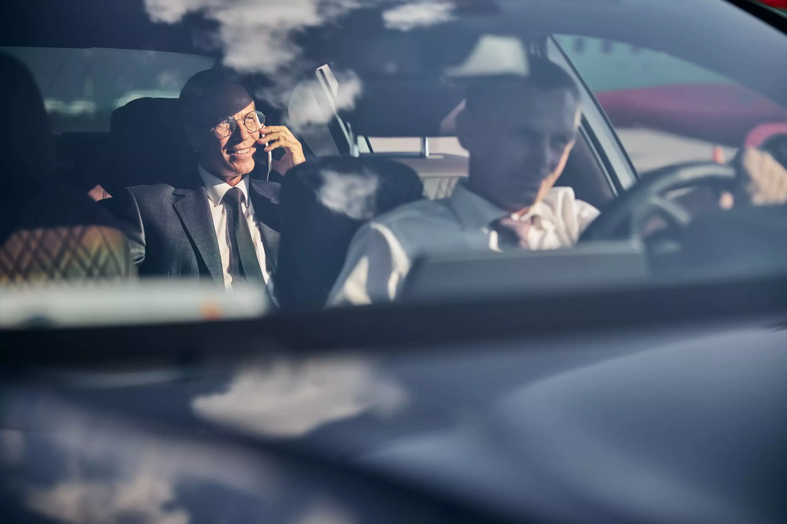 smiling businessman with smartphone travelling wit 2021 09 03 21 02 51 utc min scaled